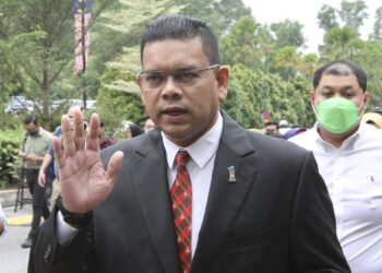 Former UMNO centre committee members Datuk Lokman Adam face to The court at Kuala Lumpur High Court.— LOW BOON TAT/THE STAR