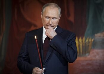 Russian President Vladimir Putin attends the Orthodox Easter service in the Christ the Savior Cathedral in Moscow, Russia, Sunday, April 24, 2022. Eastern Orthodox churches observe the ancient Julian calendar, and this year celebrate the Orthodox Easter on April 24. (AP Photo/Alexander Zemlianichenko, Pool)