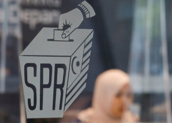 The logo of Malaysia's election commission is pictured at its headquarters in Putrajaya, Malaysia, October 20, 2022. REUTERS/Hasnoor Hussain