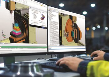 Inside the Heavy Industry Factory Close-up Footage of  Industrial Engineer's Hands Working on the Personal Computer with Two Monitors Designing Turbine/ Engine in 3D, Using CAD Program.