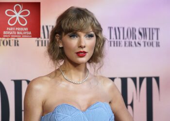 Taylor Swift arrives at the world premiere of the concert film "Taylor Swift: The Eras Tour" on Wednesday, Oct. 11, 2023, at AMC The Grove 14 in Los Angeles. (AP Photo/Chris Pizzello)