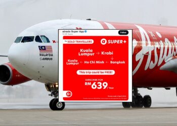 FILE PHOTO: An AirAsia X  Airbus A340 passenger jet arrives on its inaugural flight from Kuala Lumpur to Paris Orly Airport  in this February 14, 2011. REUTERS/Charles Platiau