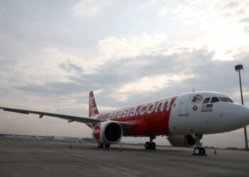 FILE PHOTO: An AirAsia Airbus A320-200 plane is pictured at Kuala Lumpur International Airport in Sepang, Malaysia, July 22, 2019. REUTERS/Lim Huey Teng