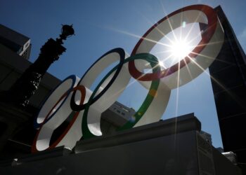 Summer sunshine is seen through Olympic rings displayed at Nihonbashi district in Tokyo, Japan August 5, 2019. Picture taken August 5, 2019.