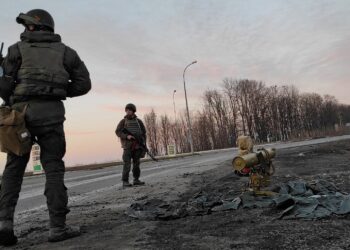 Service members of the Ukrainian armed forces stand next to a tripod-mounted missile system outside Kharkiv, Ukraine February 24, 2022. REUTERS/Maksim Levin