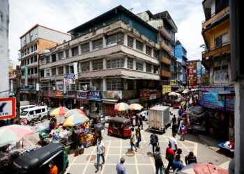 People walk along the Pettah Market, amid the country's economic crisis, in Colombo, Sri Lanka, April 18, 2022. REUTERS/Navesh Chitrakar