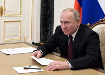 Russian President Vladimir Putin chairs a meeting with members of the country's Paralympic team ahead of the Beijing 2022 Paralympic Winter Games via a video link in Moscow, Russia February 21, 2022. Sputnik/Alexey Nikolsky/Kremlin via REUTERS